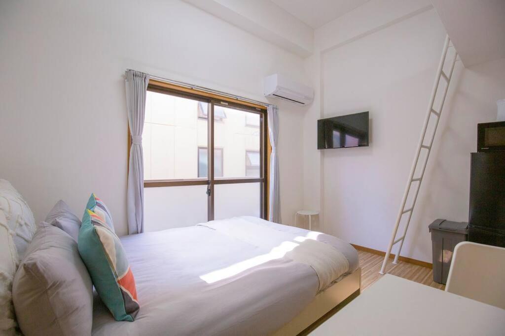 閑静な住宅街_暖かく居心地の良いデザイン Eos-J Токіо Екстер'єр фото
